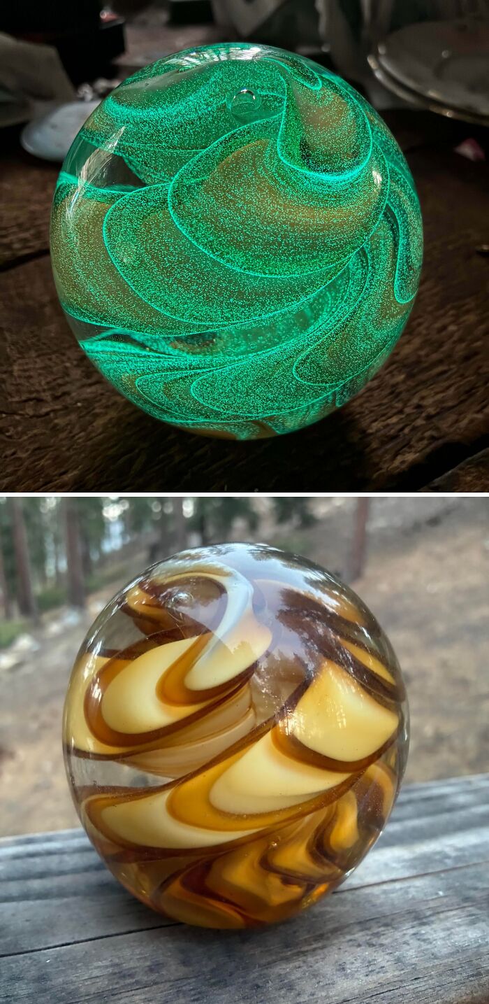 Two creative glass items featuring swirling green and amber patterns displayed on wooden surfaces.