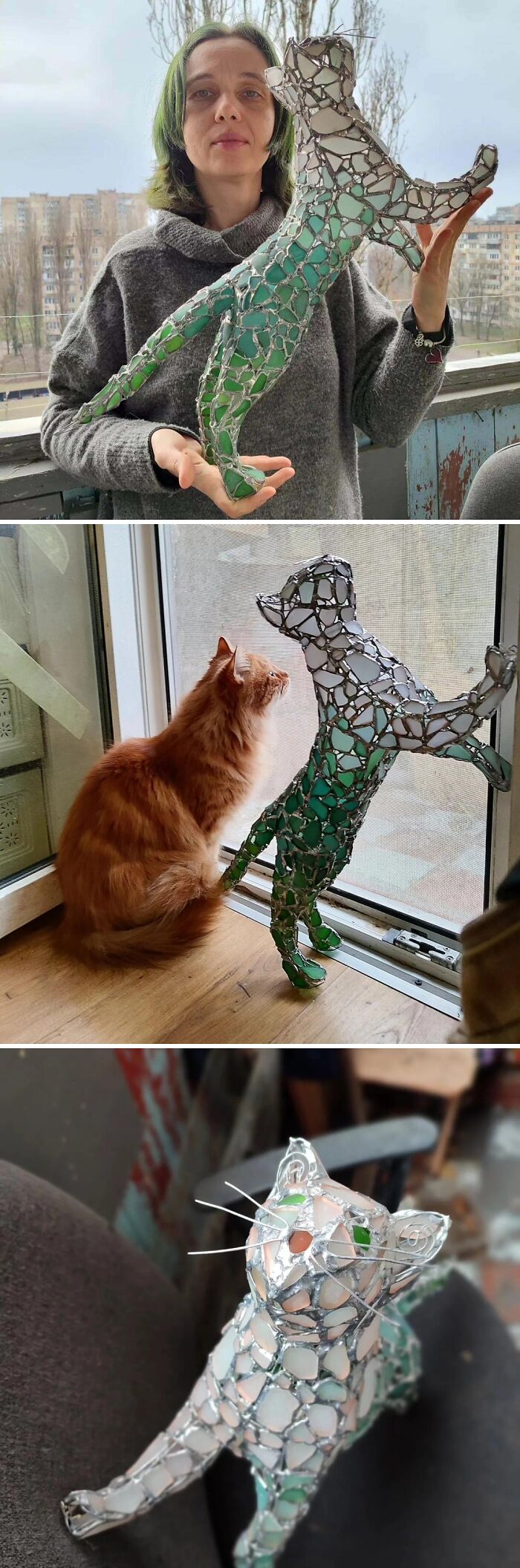 Creative glass item shaped like a cat made from colorful glass pieces held by a woman and placed near a real cat.