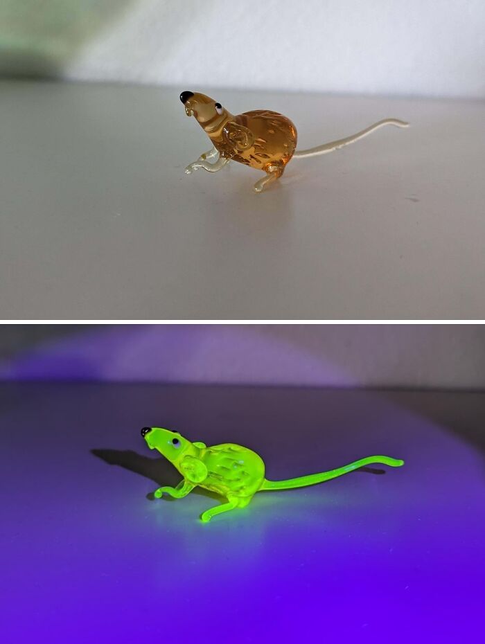 Miniature glass mouse figurines, one amber and one glowing green under blacklight, showcasing creative glass items for home decor.