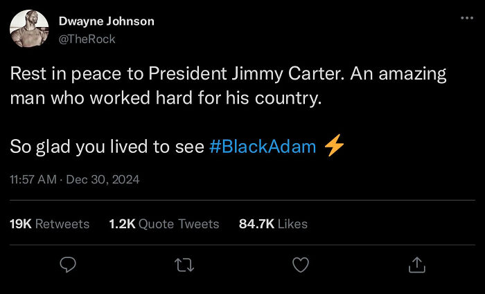 Tweet from Dwayne Johnson expressing condolences to President Jimmy Carter and mentioning the film Black Adam in the movie industry.