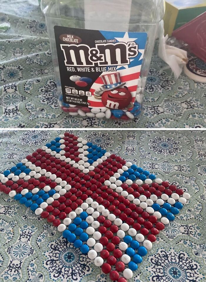 Red white and blue M&M's arranged in a Union Jack flag pattern highlighting first-world anarchists creativity.
