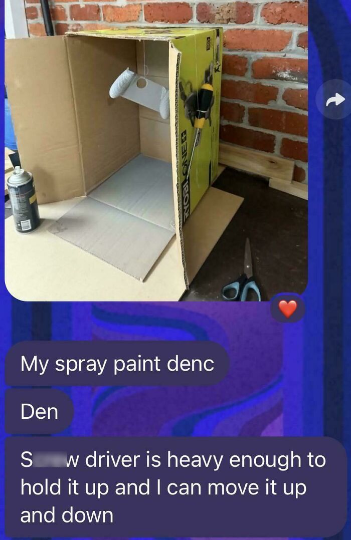 A cardboard box acting as a spray paint booth, showcasing a clever solution for random junk.