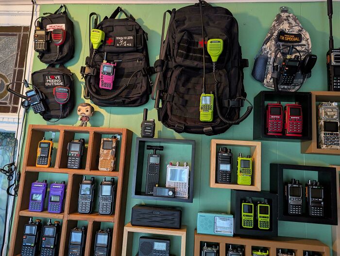 Collection of ham radios, a funny and goofy display of a dad's hobby.