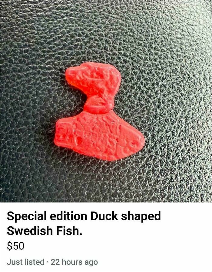 Red duck shaped Swedish Fish candy on textured surface, one of the bizarre things people are selling online.