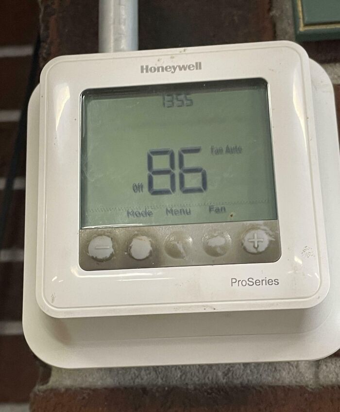 Honeywell thermostat showing 86 degrees temperature reflecting workplace discomfort and why no one wants to work anymore.