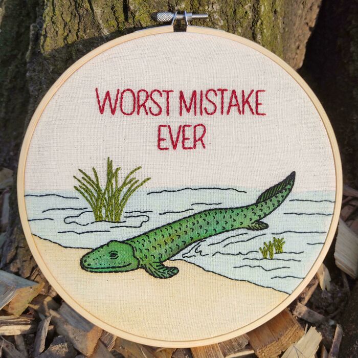 Circular embroidery creation with a green alligator and the text WORST MISTAKE EVER, inspiring hobby.