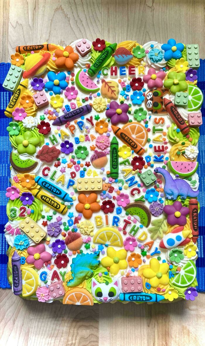 A vibrant birthday cake decorated with colorful candies and frosting, a delightful handmade project.