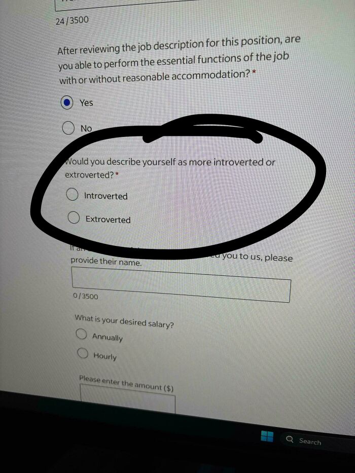 A computer screen showing a job application asking if the applicant is introverted or extroverted, for a new job.