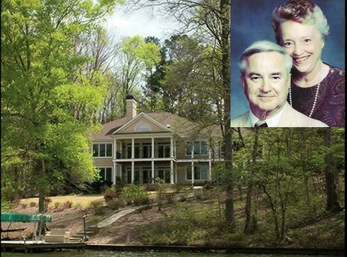 Large house surrounded by trees near a lake with an inset portrait of an elderly couple linked to unsettling mysteries.