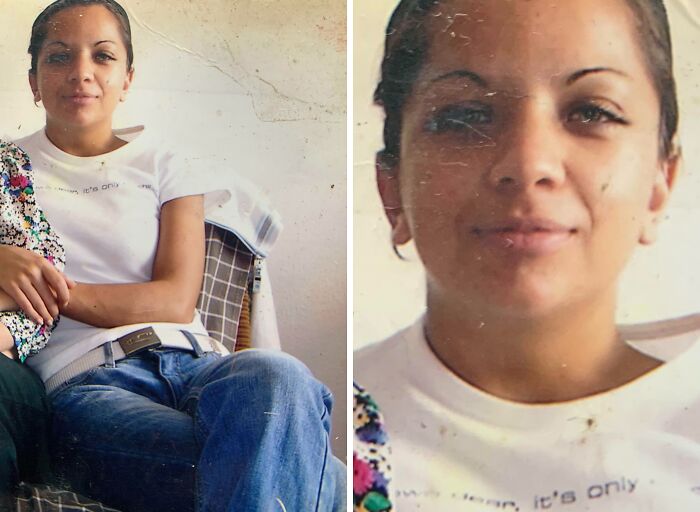 Woman with crazy eyebrows seemingly living their own lives, wearing a white shirt and sitting with a relaxed posture.