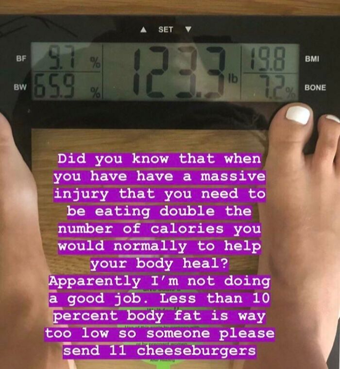 Digital scale showing weight and body fat percentages with humorous text about injury, calories, and body fat in a cringeworthy photo.