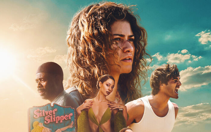 Euphoria season 3 promotional image featuring main characters under a bright sky with dramatic expressions.