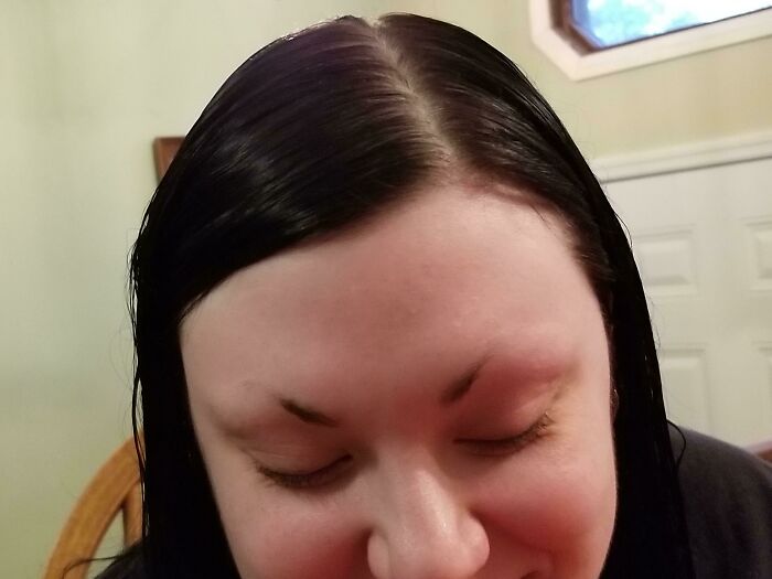 Close-up of a person with crazy eyebrows appearing to move independently on their face, creating a humorous look.