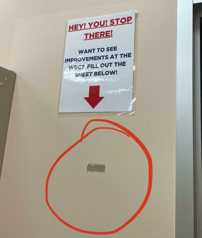 Gym sign instructing to fill out a suggestions sheet below, circled in red, showcasing a Darwin Award contender gym fail.