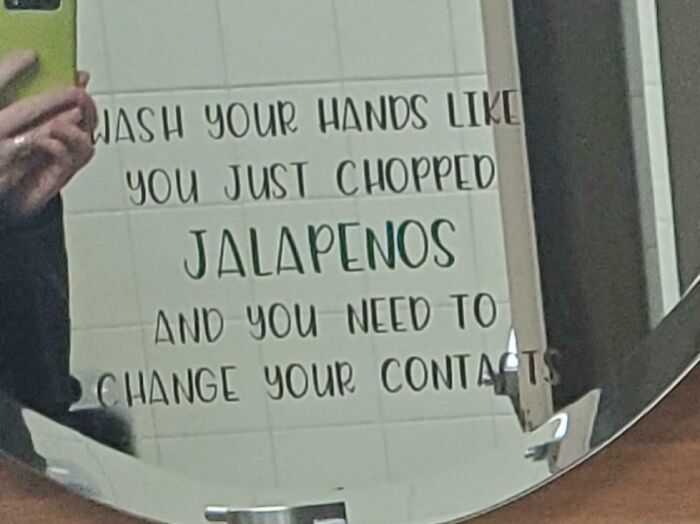 Mirror reflection of a funny piece of advice to wash hands after chopping jalapenos, highlighting funny pieces of advice.