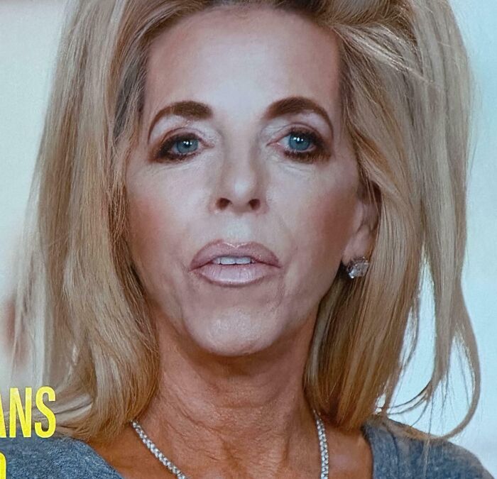 Close-up of a woman with crazy eyebrows that seem to live their own lives on her face.