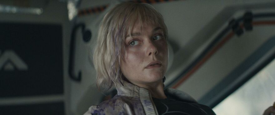 Young woman in a futuristic setting, highlighting one of the supporting performances that stole the show.