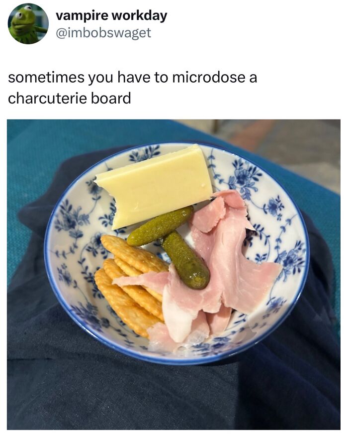 Small charcuterie board with cheese, pickles, crackers, and ham, fitting the funny and relatable memes theme.