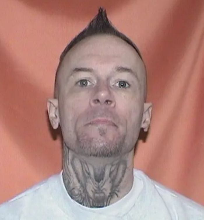 Man with neck tattoos accused of horrific crimes found partying with spring breakers at Daytona Beach