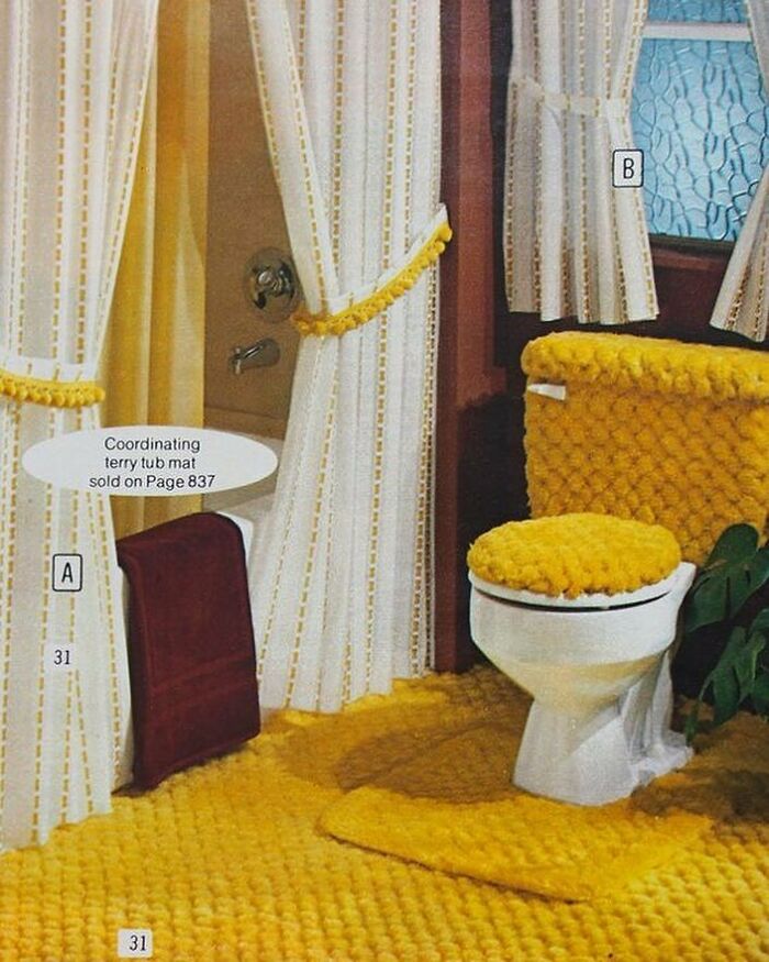 Bathroom with matching bright yellow carpeted toilet cover and rug, showcasing one of the home design disasters.