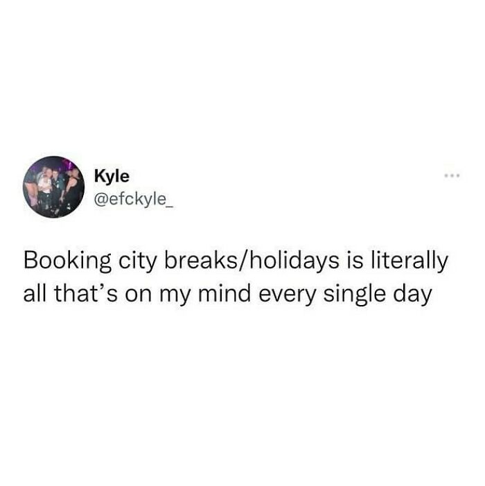 Tweet about booking city breaks and holidays, reflecting British humor and travel obsession in daily thoughts.