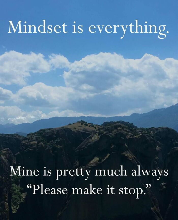 Scenic mountain view with clouds and an anti-motivational affirmation about mindset in a humorous tone.
