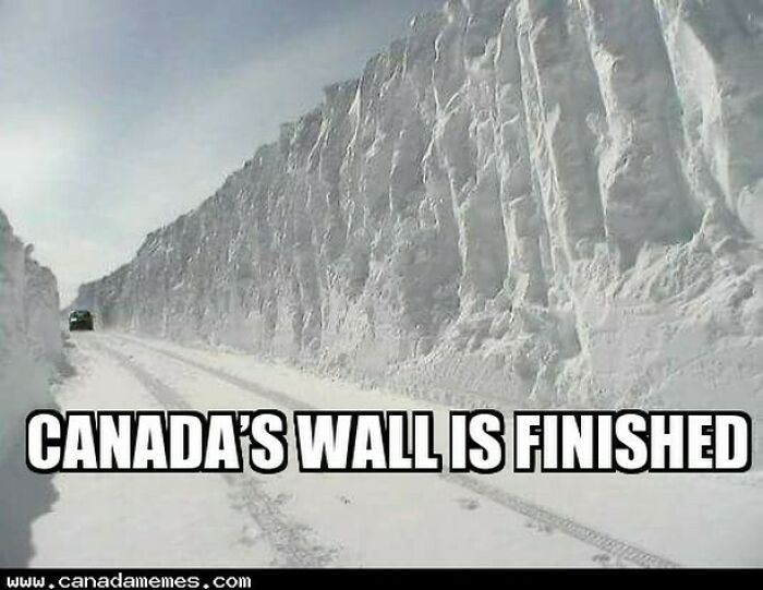 Snowy road with towering snow walls on either side, illustrating a funny Canada meme about winter and poutine cravings.