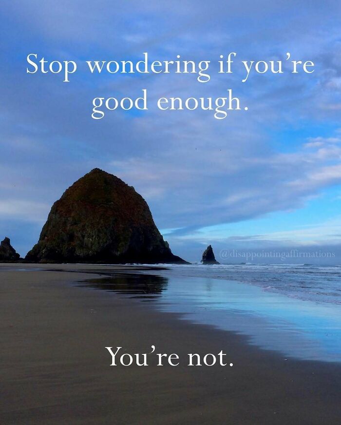 Rock formation on a calm beach with a cloudy sky, featuring anti-motivational affirmations about self-worth.