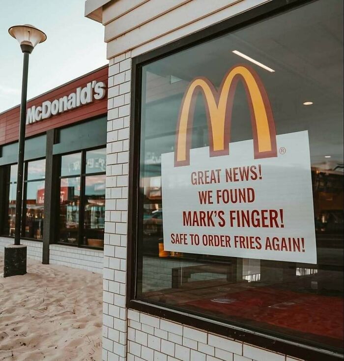 McDonald's restaurant with a humorous sign about fries, appealing to people who love food and enjoy memes.