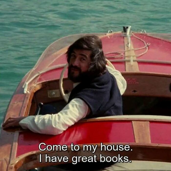 Man on a boat looking back with text about inviting someone over, related to memes and existential crisis humor content.