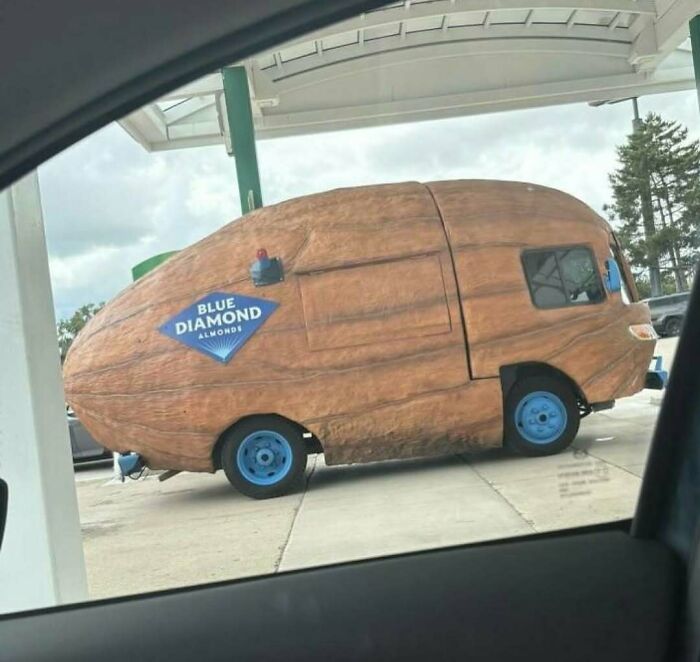 Vehicle shaped like an oversized almond with Blue Diamond branding, an example of cursed photos that make zero sense.