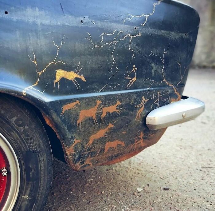 Rusty car bumper with animal and human-like figures resembling cursed photos that make zero sense in an eerie style.