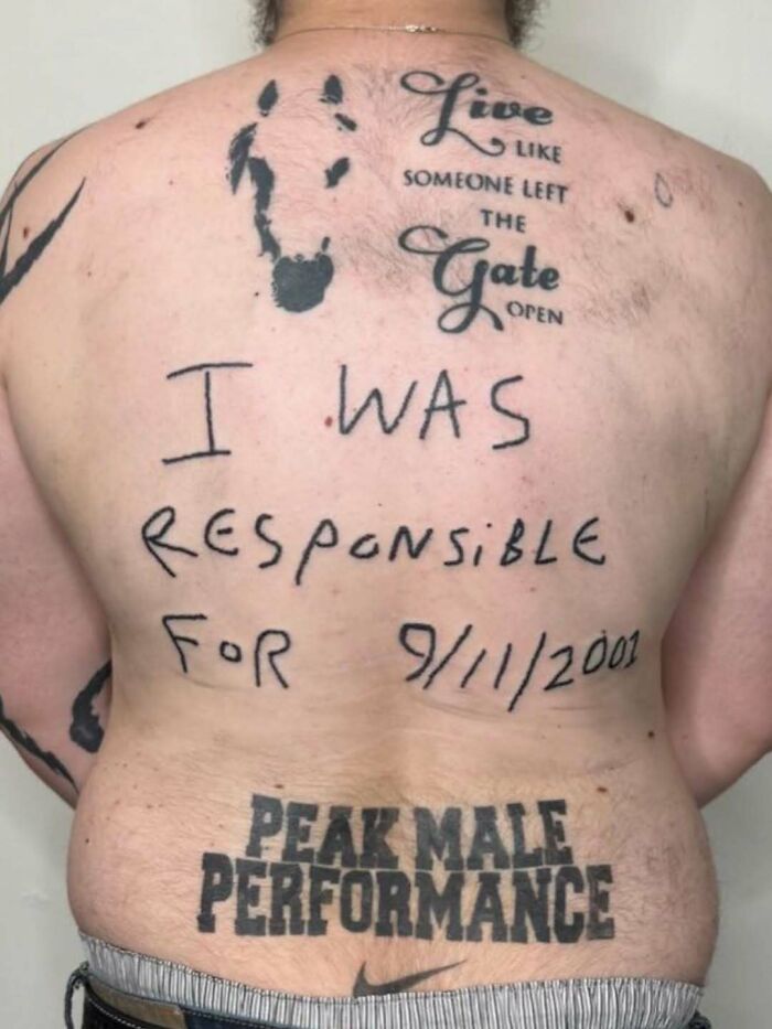 Man with tattooed back featuring unusual text and images, an example of cursed photos that make absolutely zero sense.
