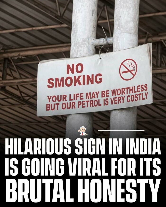 No smoking sign at petrol station in India with humorous message, one of the wholesome and interesting facts worldwide.