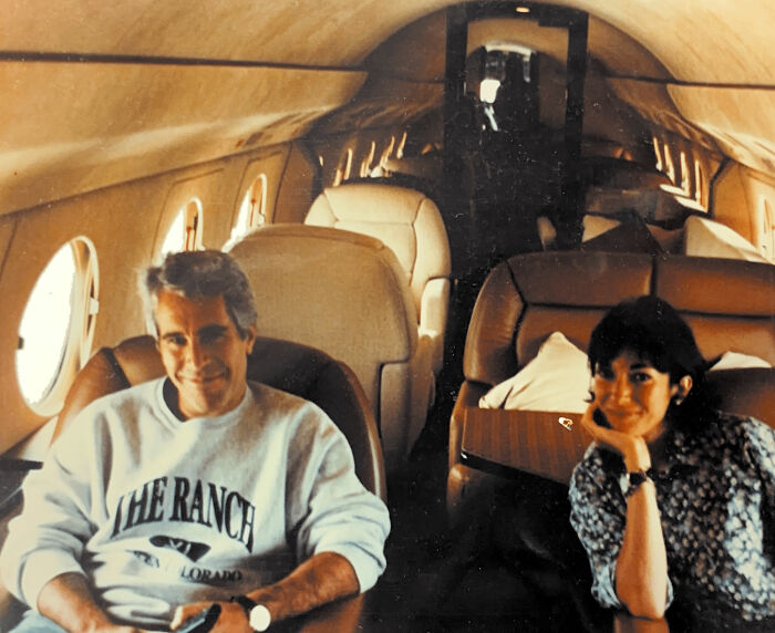 Man and woman sitting inside a private jet, relating to politician who called Ghislaine Maxwell his soulmate found deceased.