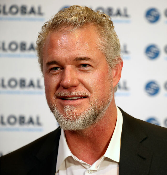 Eric Dane at a public event, pictured with gray hair and beard, related to Shonda Rhimes defending Oscars' tribute decision.