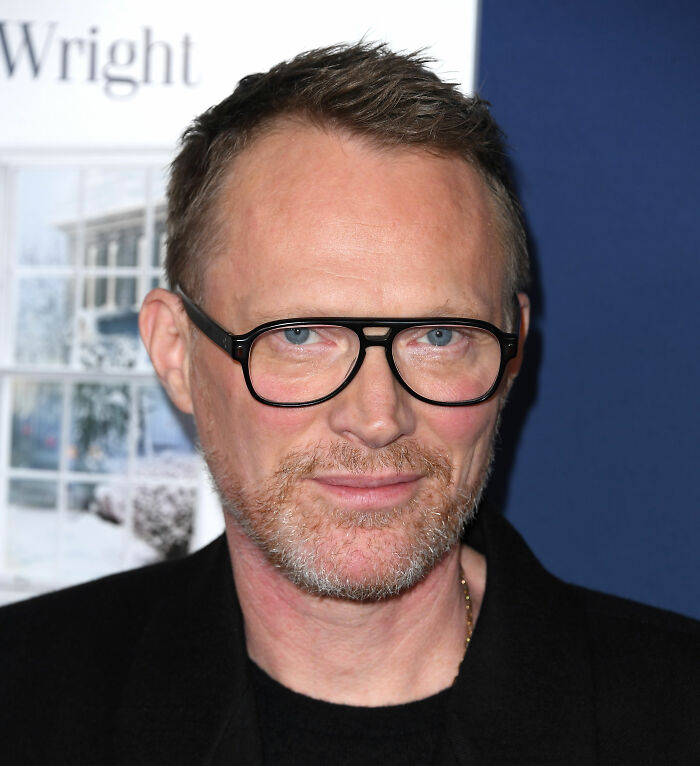 A man with short hair and glasses at an event, related to new name topping list to play Voldemort roles. A man with short hair and glasses at an event, related to new name topping list to play Voldemort roles.