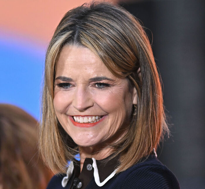 Savannah Guthrie smiling during emotional return to Today Show amid mom's kidnapping case and growing suspicion.