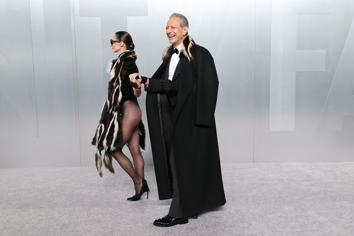 Emilie, Jeff Goldblum&rsquo;s wife, turns heads in a pantsless look paired with a fur coat at the Oscars afterparty.