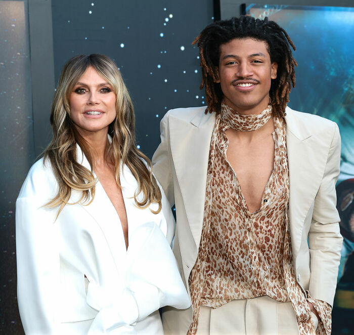 Heidi Klum and her son posing together at a premiere, showcasing her son's star-like look. Heidi Klum and her son posing together at a premiere, showcasing her son's star-like look.