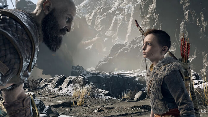 Characters from God of War game in a snowy mountain setting, related to God of War creator and Amazon live-action.