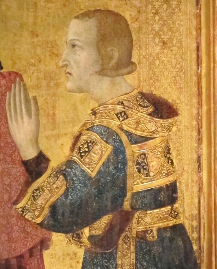 Medieval painting of a man in ornate armor, illustrating historical crazy things people did for love.