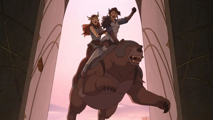 Two female warriors riding a fierce bear, an action scene from The Legend Of Vox Machina Season 4 animation.