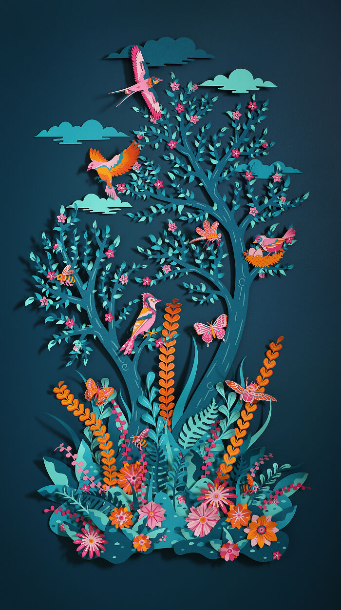 Intricate handcrafted paper art depicting birds, flowers, and foliage in vibrant colors by French artist duo.