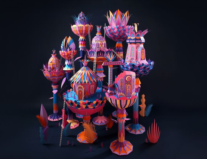 Colorful handcrafted paper sculpture resembling a whimsical miniature world created by French artist duo.