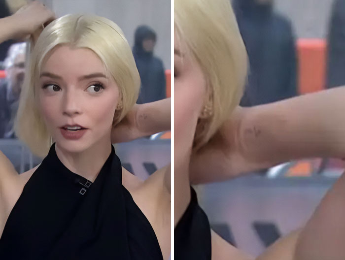 Anya Taylor-Joy with blonde hair and black top during an interview, fans notice an odd detail sparking debate.