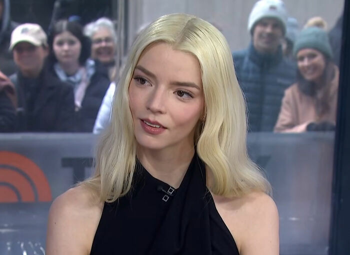 Anya Taylor-Joy with blonde hair in a black top during an interview facing backlash on the Today show.