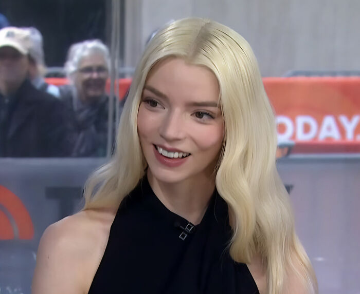 Anya Taylor-Joy smiling during an interview appearance, sparking heated debate after fans spot odd detail.