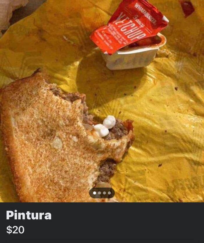 Partially eaten sandwich with mayonnaise beads and ketchup packet on a yellow wrapping, a funny Facebook Marketplace listing.
