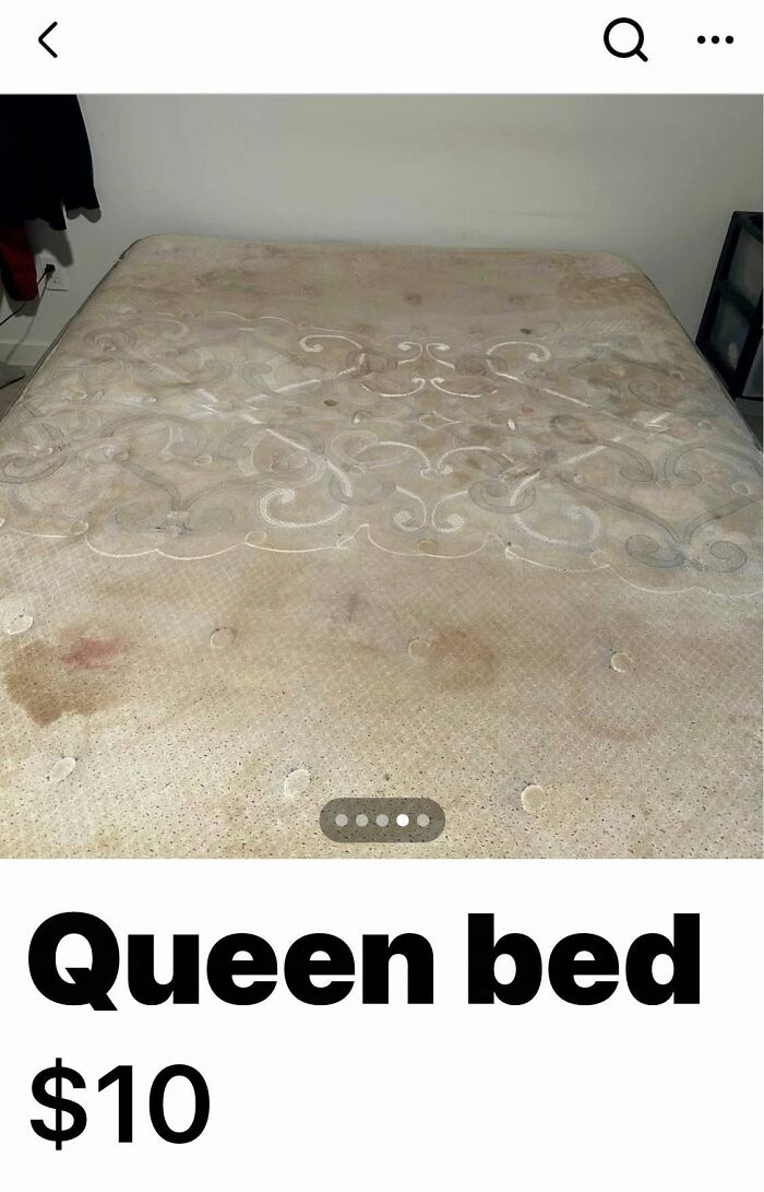 Worn and heavily stained queen bed mattress listed on Facebook Marketplace in an unhinged pics collection.